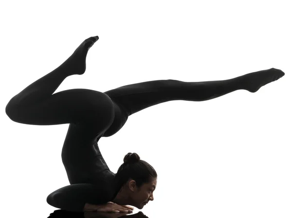 Woman contortionist  exercising gymnastic yoga   silhouette — Stock Photo, Image