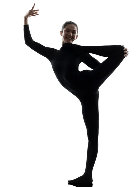 Woman contortionist  exercising gymnastic yoga   silhouette — Stock Photo, Image