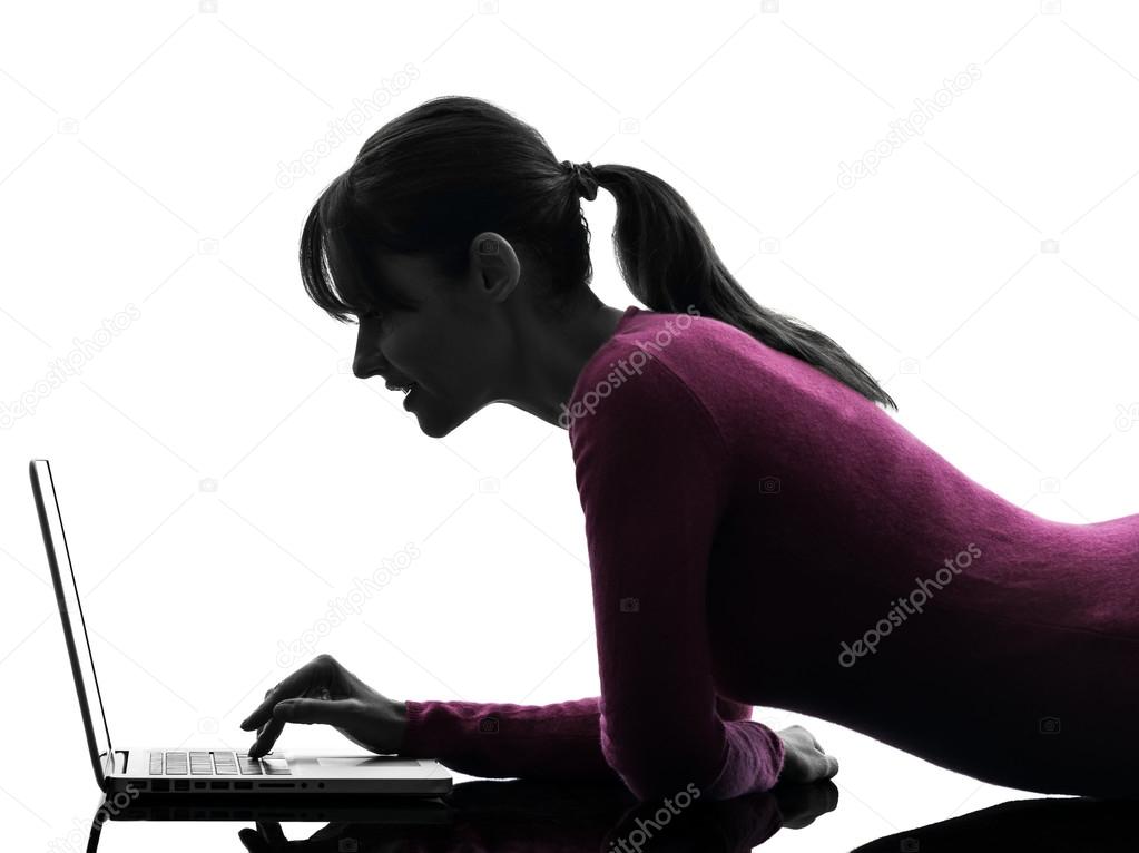 Woman computing laptop computer