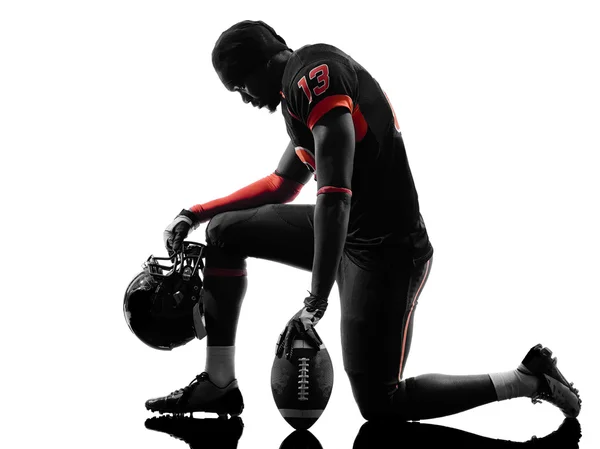 American football player kneeling — Stock Photo, Image