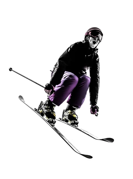 Une femme skieuse saut à ski silhouette — Photo