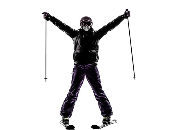 Bir kadın kayakçı kollarını açmış mutlu bir siluet çiziyor. — Stok fotoğraf