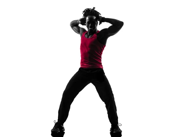 Homem africano exercitando aptidão zumba dança silhueta — Fotografia de Stock