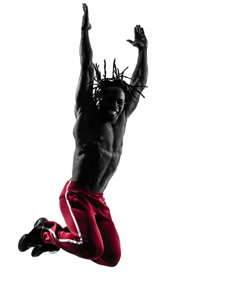 Uomo africano che esercita fitness zumba danza silhouette — Foto Stock