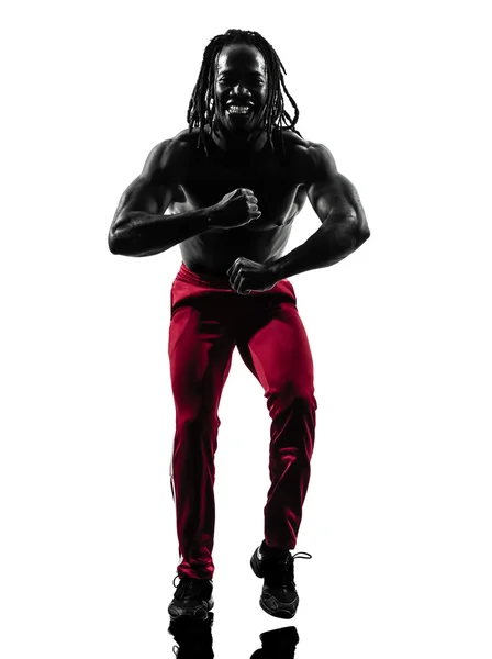 African man exercising fitness zumba dancing silhouette — Stock Photo, Image