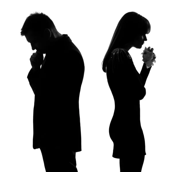 One sad couple back to back man thinking and woman crying silhou — Stock Photo, Image