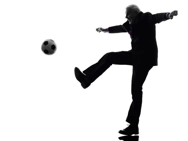 Senior business man playing soccer silhouette — Stock Photo, Image