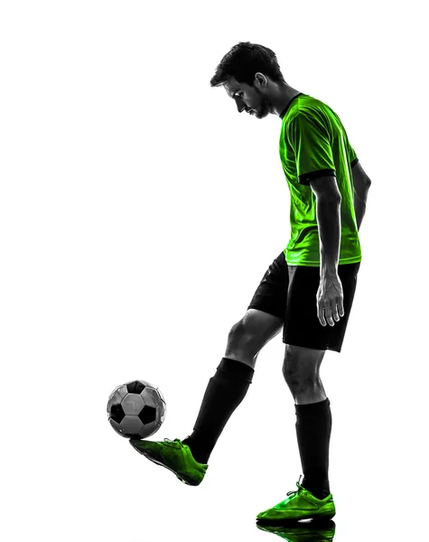 Voetbal voetbal speler jonge man jongleren silhouet — Stockfoto