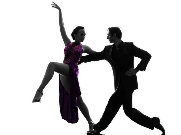 Couple man woman ballroom dancers tangoing  silhouette — Stock Photo, Image