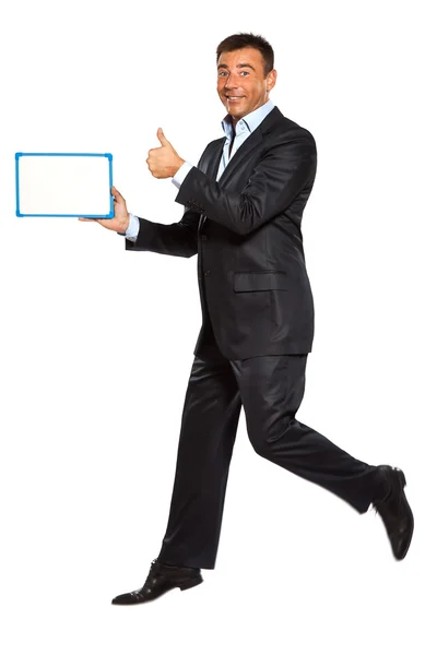 One man running jumping holding whiteboard Royalty Free Stock Photos