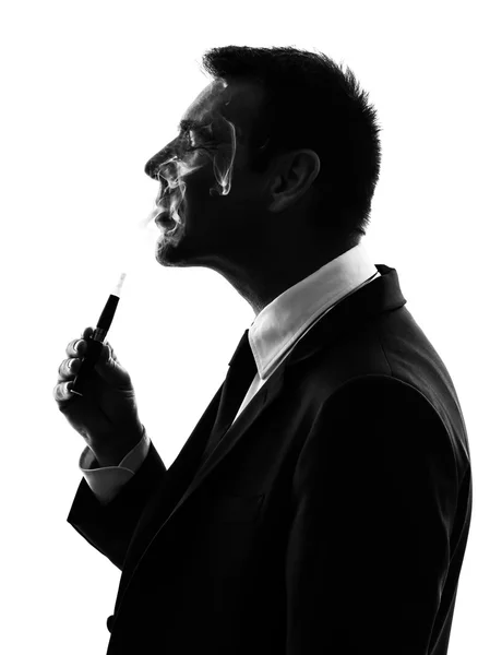 Verksamhet man röka elektronisk e-cigarett siluett — Stockfoto