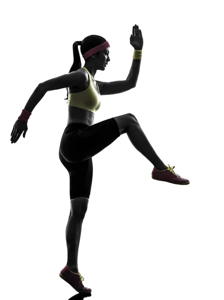 Mujer ejercitando la silueta de entrenamiento de fitness —  Fotos de Stock