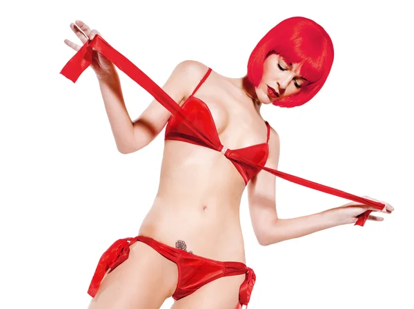 Sexy seductress woman undressing — Stock Photo, Image