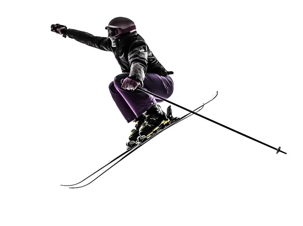 Une femme skieuse saut à ski silhouette — Photo