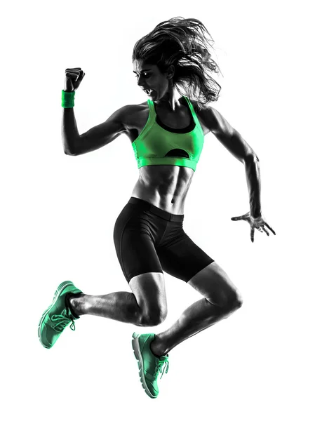 Jumping fitness žena vykonává silueta — Stock fotografie