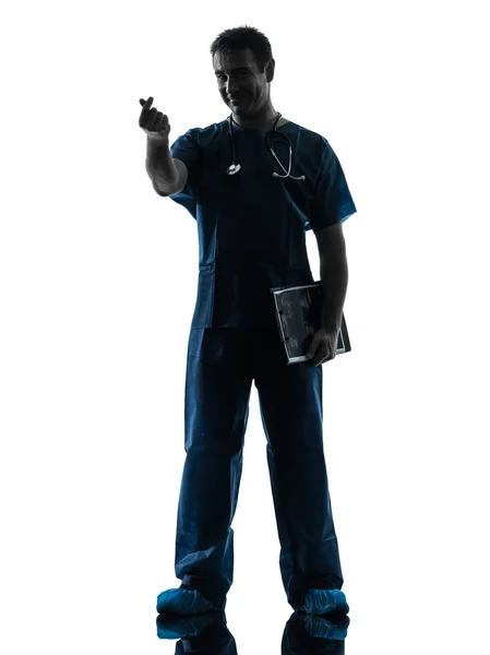 Doctor man silhouette standing full length gesturing money — Stock Photo, Image