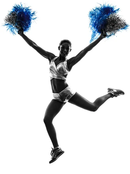 Mladá žena roztleskávačka cheerleadingu silueta — Stock fotografie