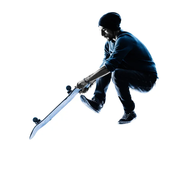 Man skateboarder skateboarding silhouette — Stock Photo, Image