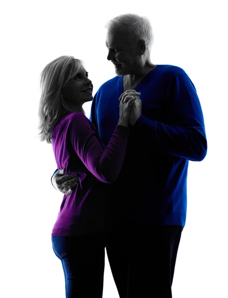 Couple senior lovers dancing silhouette — Stock Photo, Image