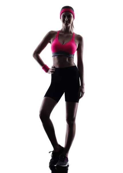 Sexy beautiful woman fitness standing silhouette — Stock Photo, Image