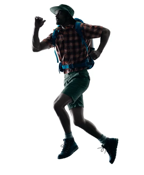 Homem trekker trekking correndo silhueta feliz — Fotografia de Stock