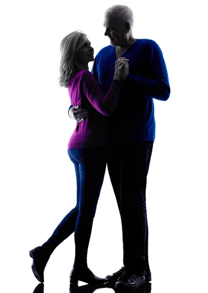 Couple senior lovers dancing silhouette — Stock Photo, Image