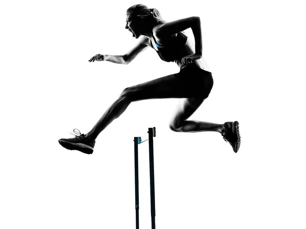 Woman hurdlers  hurdling  silhouette — Stock Photo, Image
