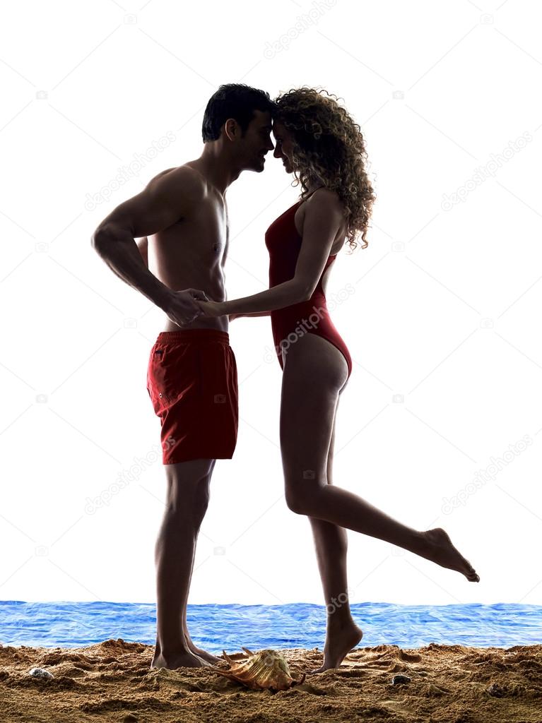 couple lovers kissing on the beach  