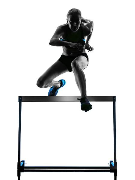 Woman hurdlers  hurdling  silhouette — Stock Photo, Image