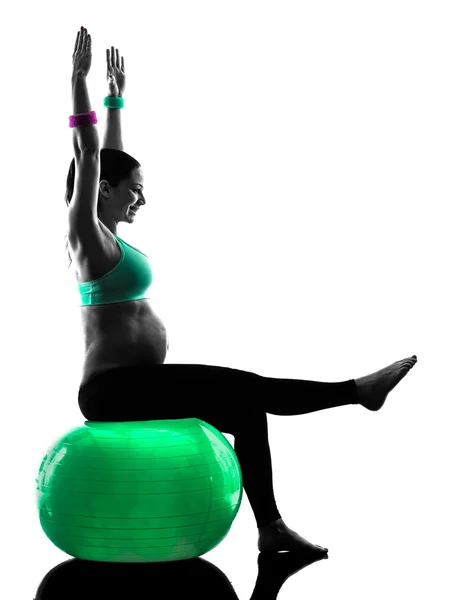 Mulher grávida exercícios de fitness silhueta — Fotografia de Stock