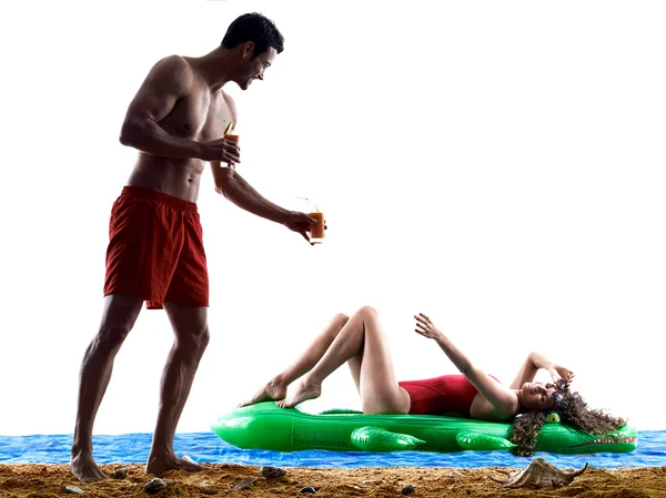 Couple on the beach drinking — Stock Photo, Image