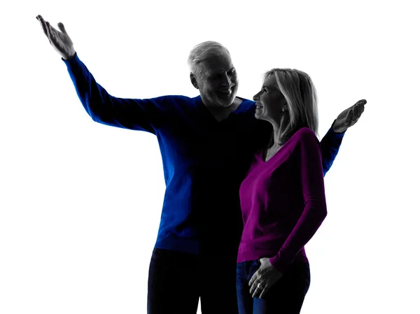 Couple senior happy pointing silhouette — Stock Photo, Image