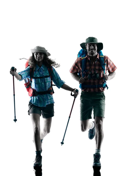 Couple trekker trekking running happy silhouette — Stock Photo, Image