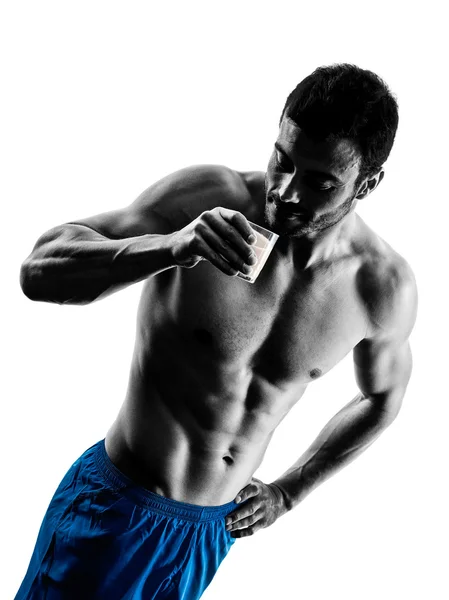 Mens fitness oefeningen drinken melk silhouet — Stockfoto