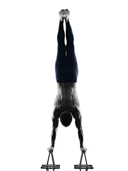 Man pilates exercises fitness isolated Stock Image