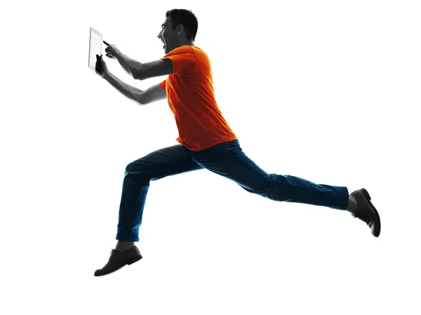 Hombre corriendo tabletas digitales silueta aislada Imagen De Stock