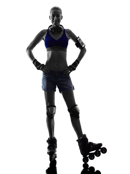 Vrouw in rolschaatsen silhouet — Stockfoto