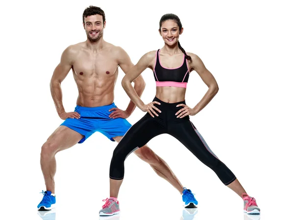 Homem casal e mulher exercícios de fitness isolados — Fotografia de Stock