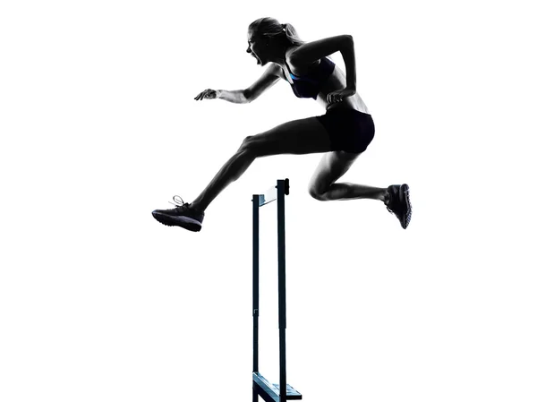 Woman hurdlers  hurdling  silhouette — Stock Photo, Image