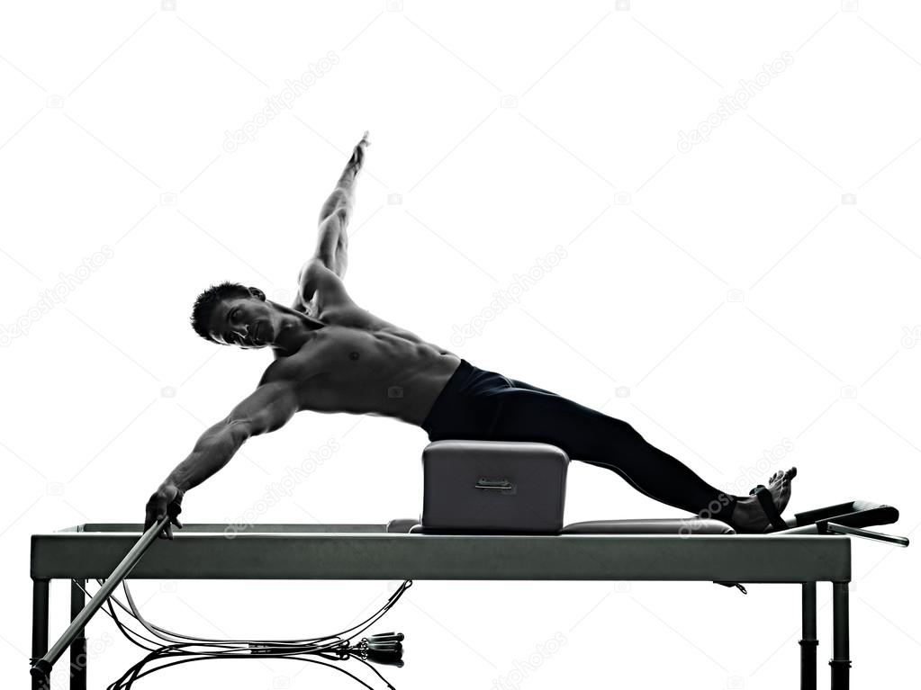 Man Pilates Reformer Exercises Fitness Isolated Stock Photo