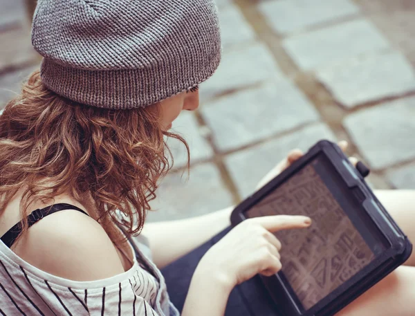Hipster girl holding tablet with gps — Stock Photo, Image