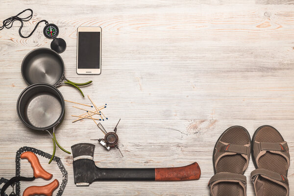 Equipment of hiking gear on floor background