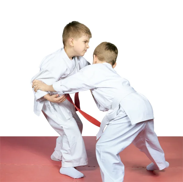 Boys in karategi are training judo techniques — Stock Photo, Image