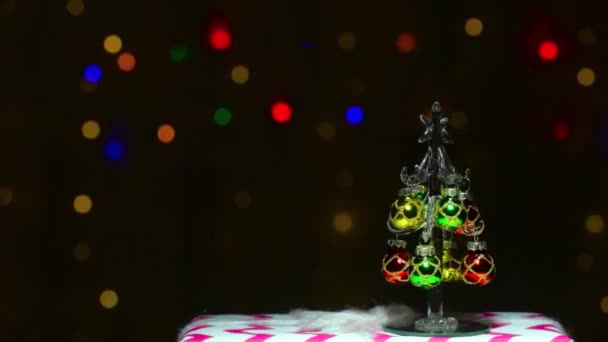Árbol Navidad Vidrio Contra Fondo Luces Colores Intermitentes Rápidos — Vídeos de Stock