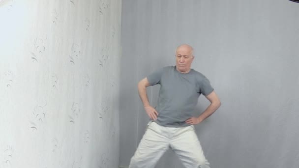 Old Man Sportswear Performs Hip Joint Warm — Stock Video