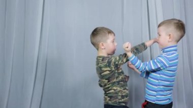 On a light background, two athletes perform paired exercises striking towards each other