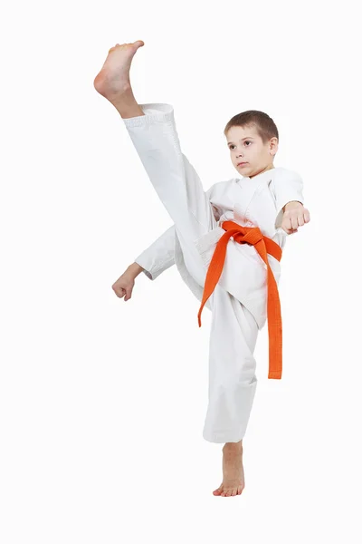 With the orange belt boy is a beating a high kick leg — Stock Photo, Image