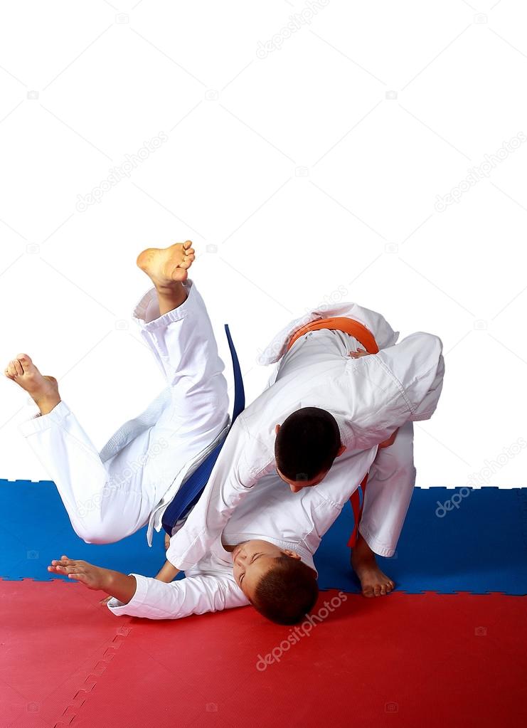 Throw of Judo made sportsman  with orange belt