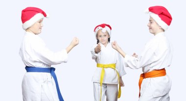 Sporcular kapaklar Noel Baba kız iki erkek arasında bir mücadele yargılamak