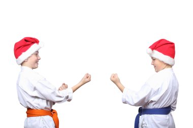 Kapaklar Noel Baba'nın küçük sporcular karate rafa duruyorsun